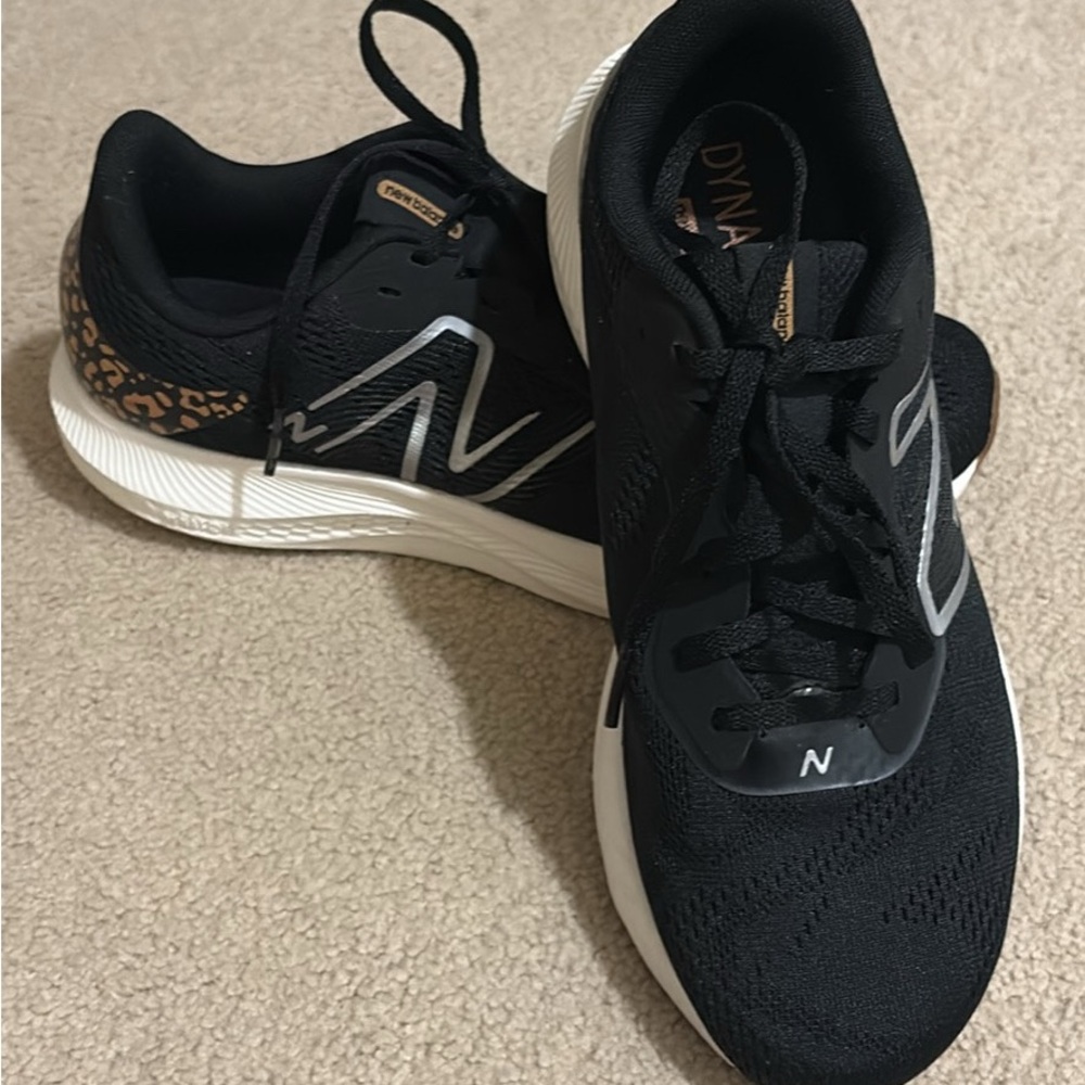 New Balance Women's Black and White Sneakers with Leopard Accent